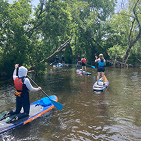photo of paddlers on creek